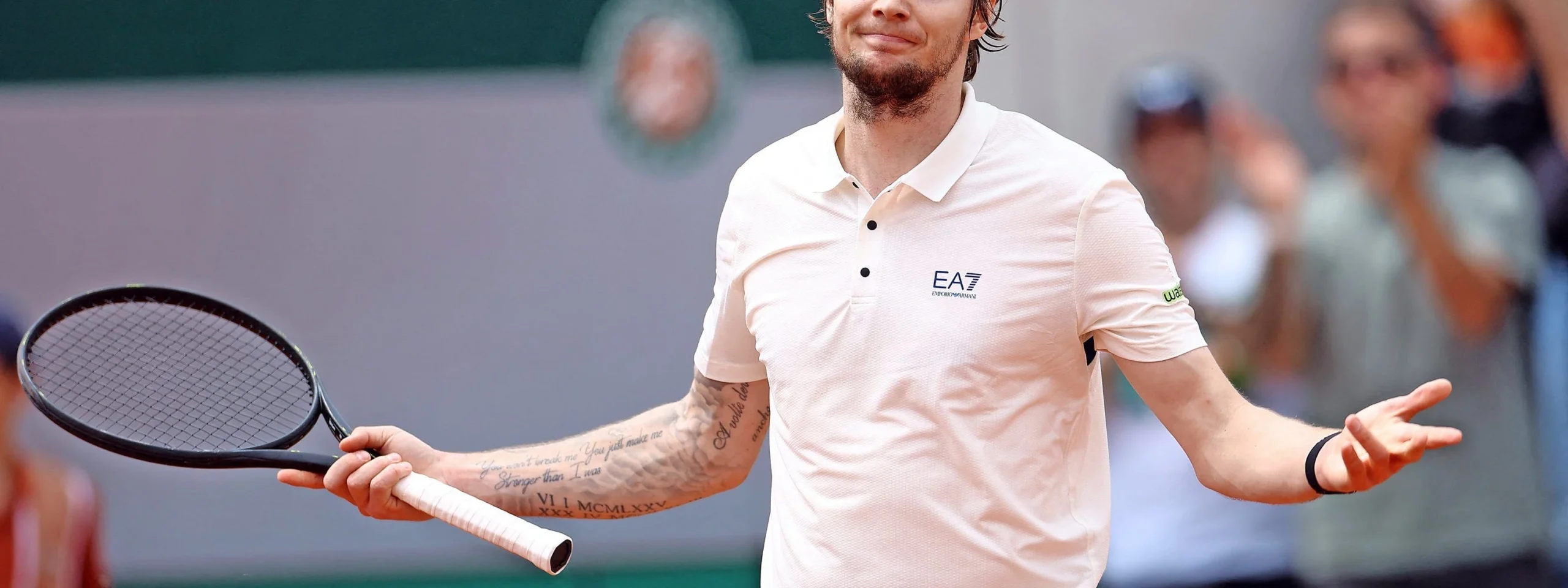 Alexander Bublik forearm quote tattoo