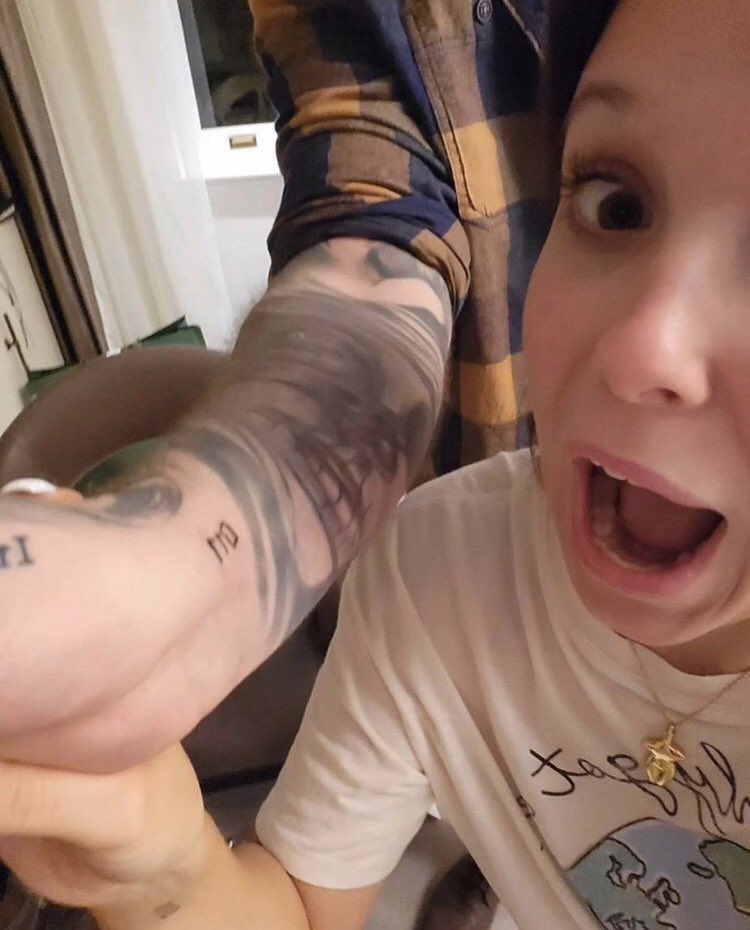 Millie Bobby Brown getting her 011 wrist tattoo