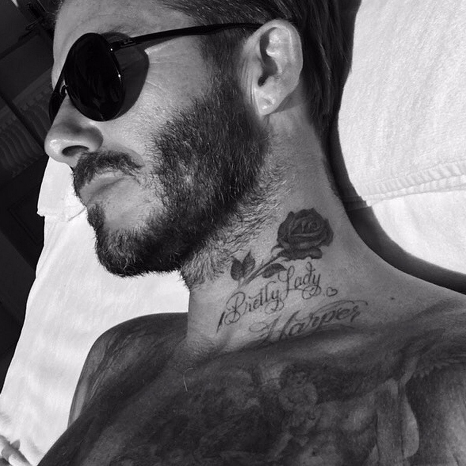 Close view of David Beckham’s neck rose and Pretty Lady Harper lettering