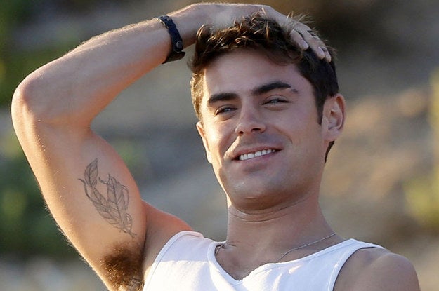 Close photograph of Zac Efron’s feather tattoo