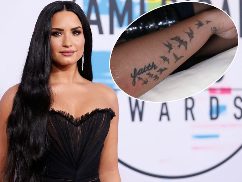 Demi Lovato’s forearm flock of bird tattoos and faith lettering