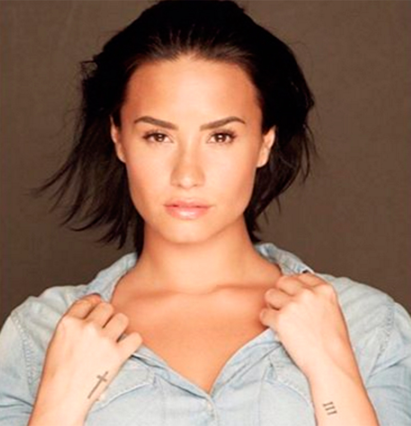 Demi Lovato’s wrist showing the Roman numeral III tattoo