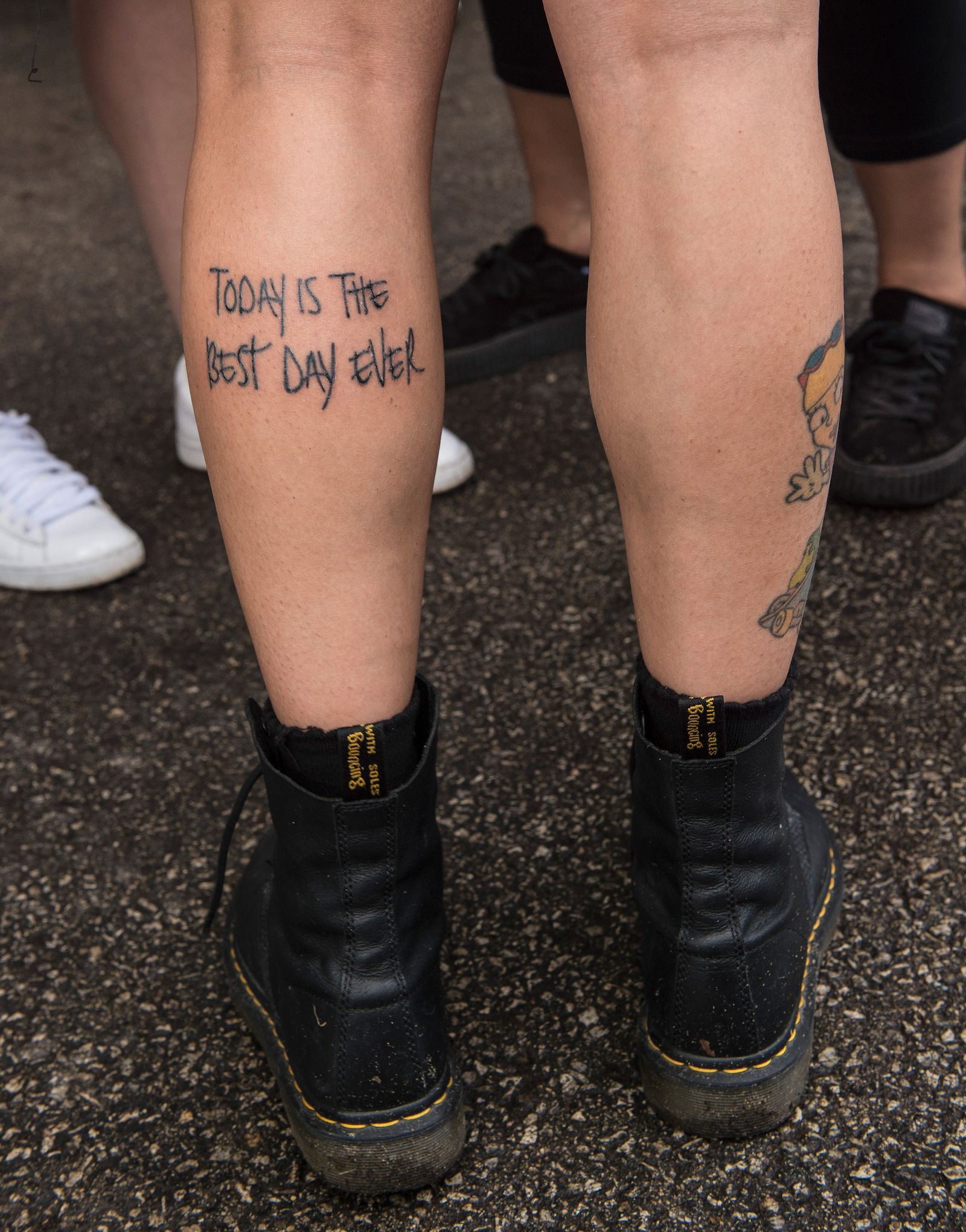 Kehlani tattooed arm showing the family-tattoo context