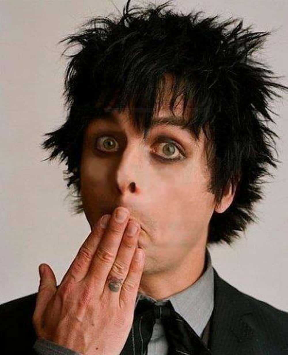 Billie Joe Armstrong chest tattoo with skull and crossbones
