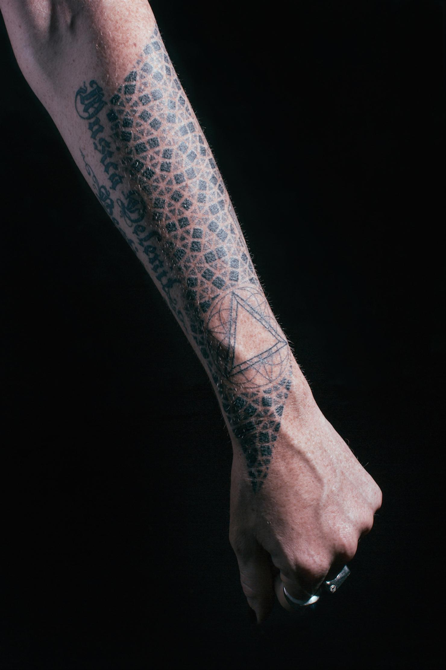 Adam Lambert Eye of Horus forearm tattoo