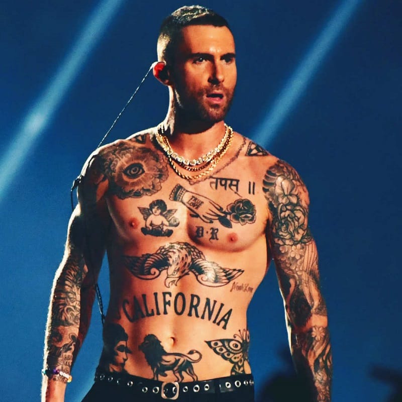Adam Levine chest and abdomen tattoos including California lettering