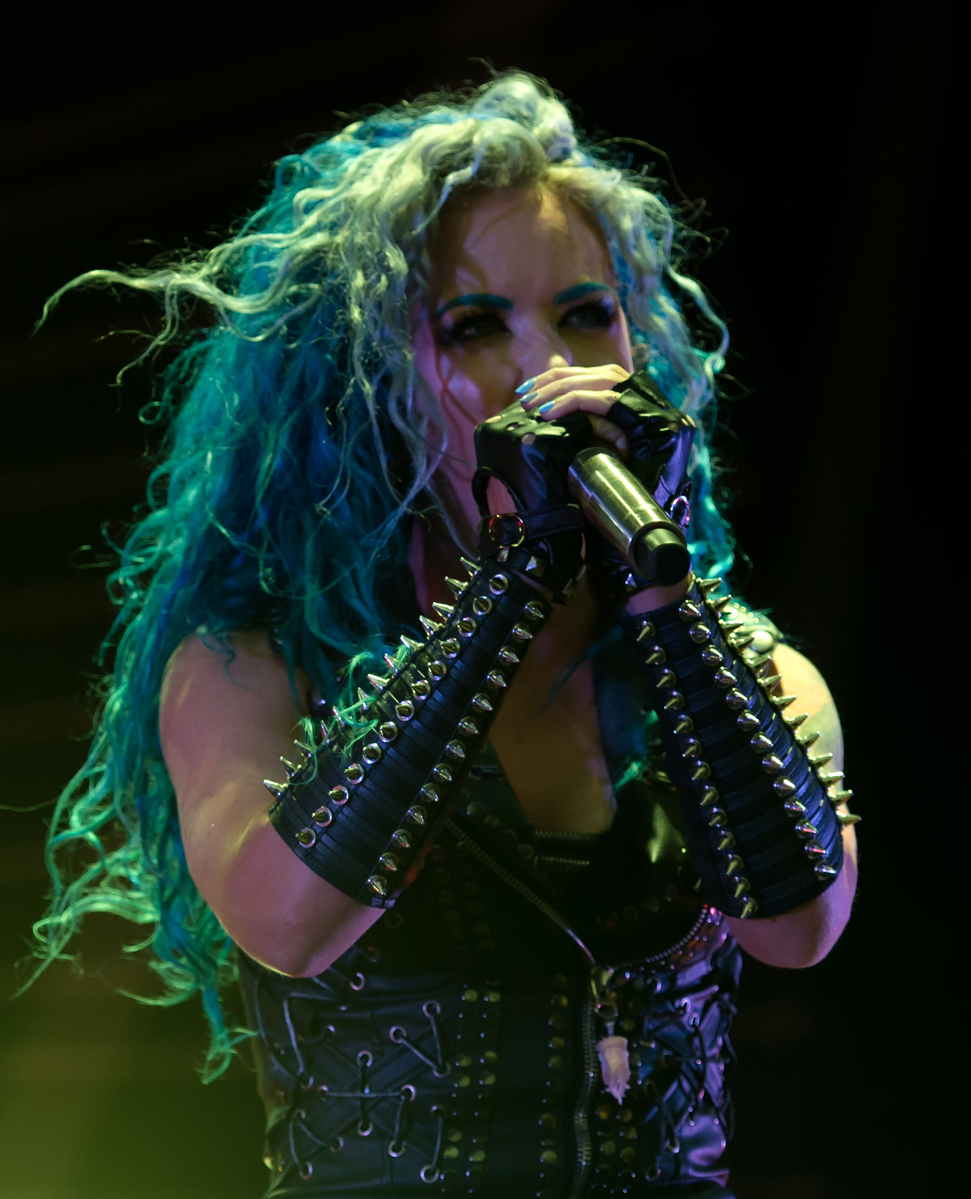 Alissa White-Gluz upper arm tattoo from a side view