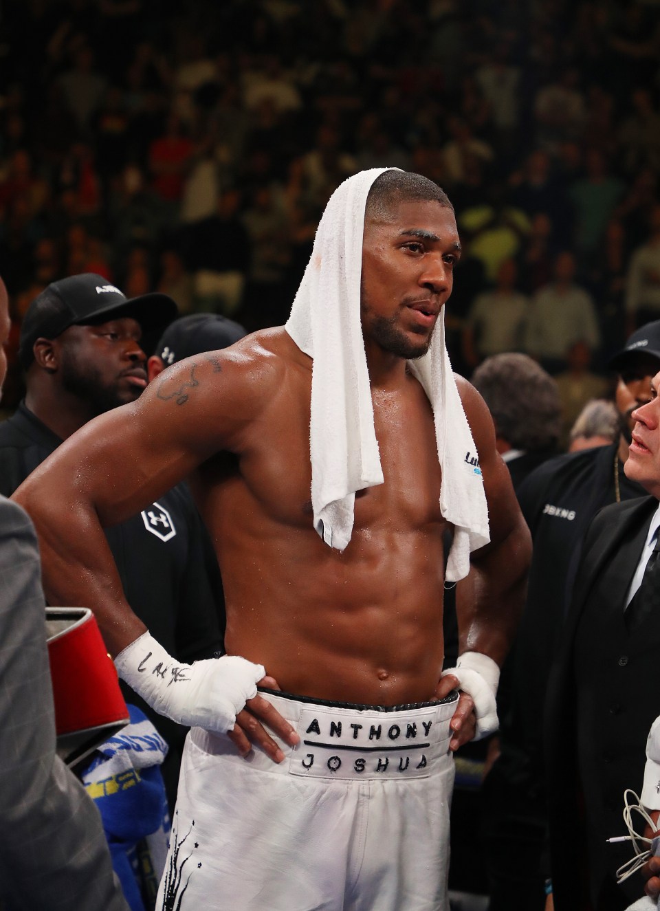 Anthony Joshua shoulder tattoo visible after a boxing match