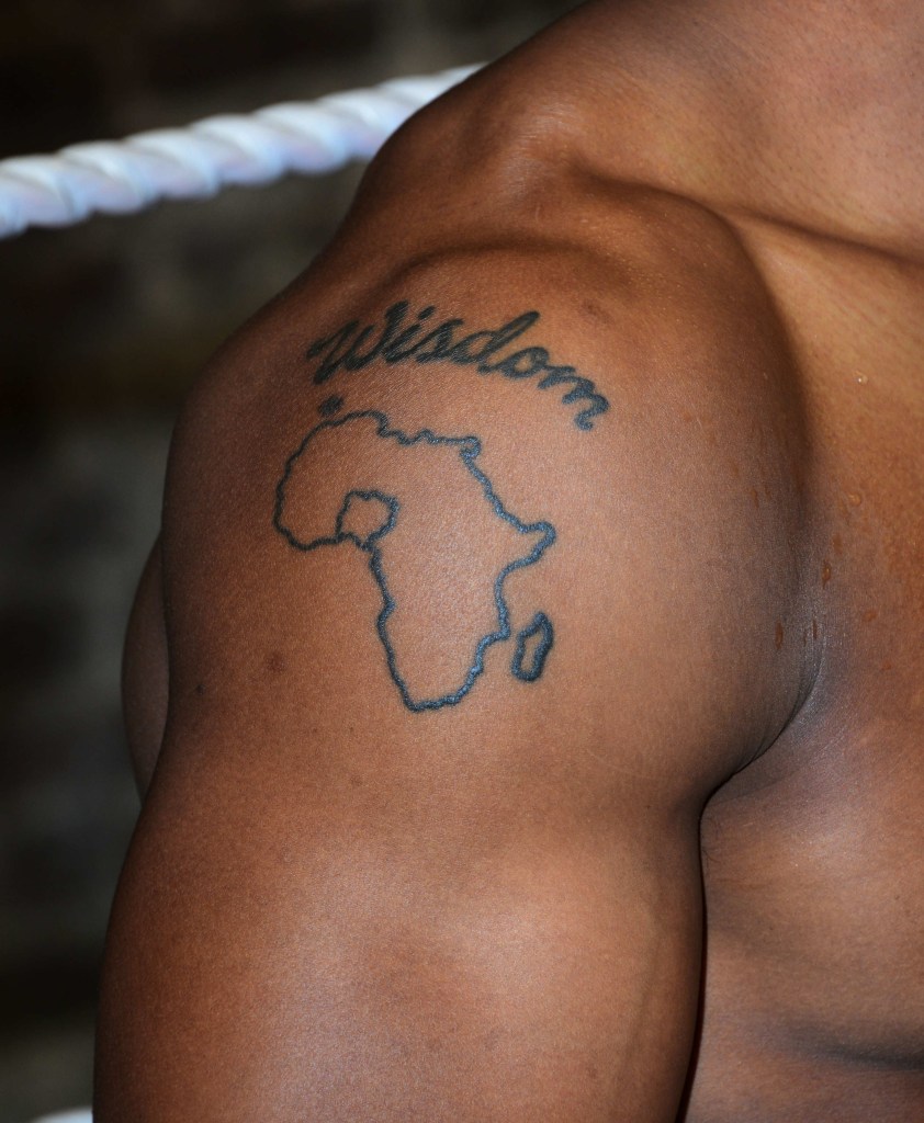 Anthony Joshua Wisdom and Africa shoulder tattoos