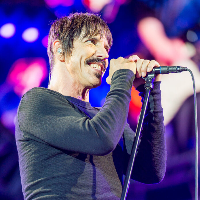 Anthony Kiedis showing the arms tattoo area
