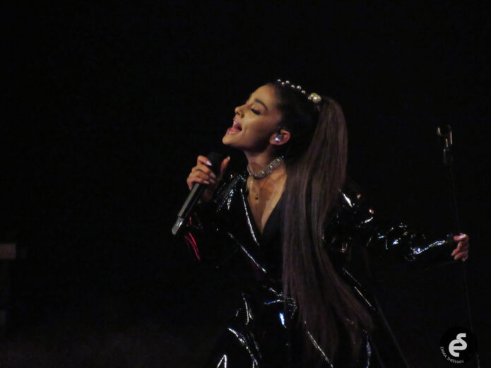 Ariana Grande showing the arms tattoo area