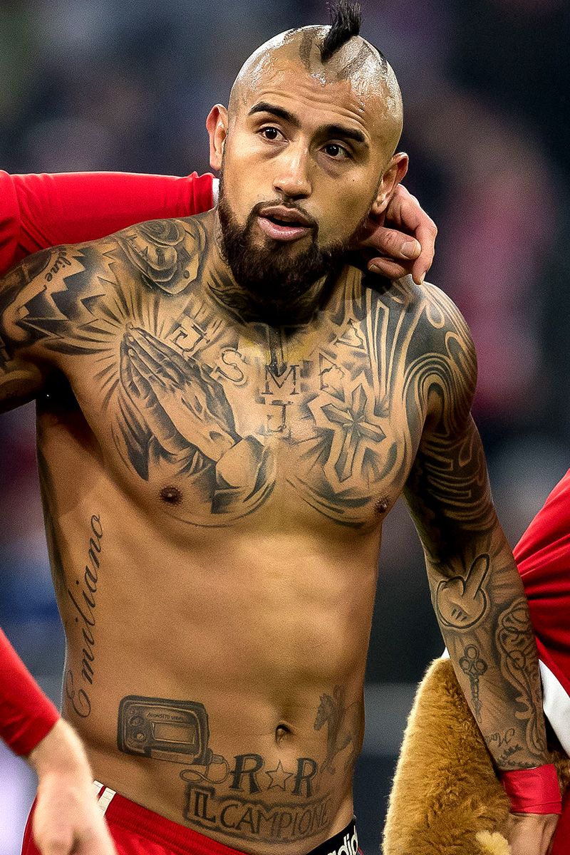 Arturo Vidal chest tattoos including Emiliano lettering