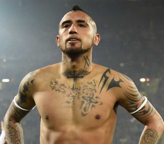 Arturo Vidal tribal arm and chest tattoos