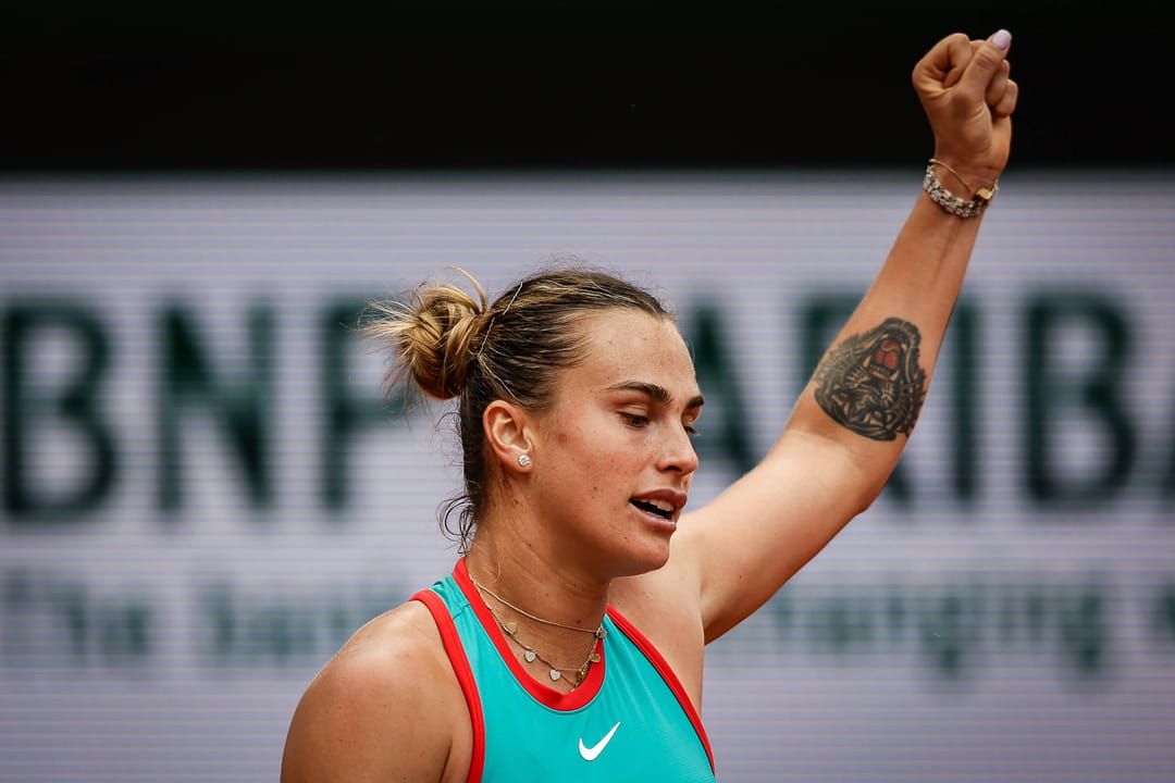 Aryna Sabalenka tiger tattoo on left arm during celebration