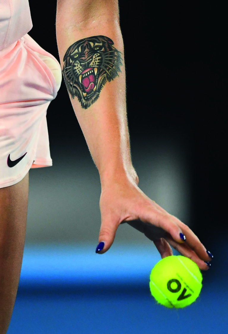 Aryna Sabalenka tiger tattoo on left arm during match