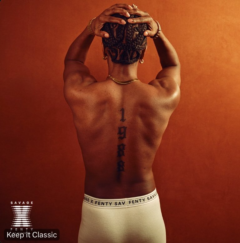 A$AP Rocky showing the vertical 1988 spine tattoo