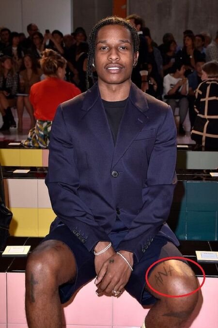 A$AP Rocky showing the ANARCHY knee tattoo
