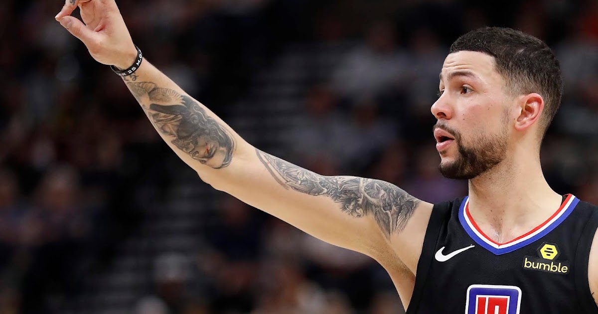 Austin Rivers tattooed arm during a game