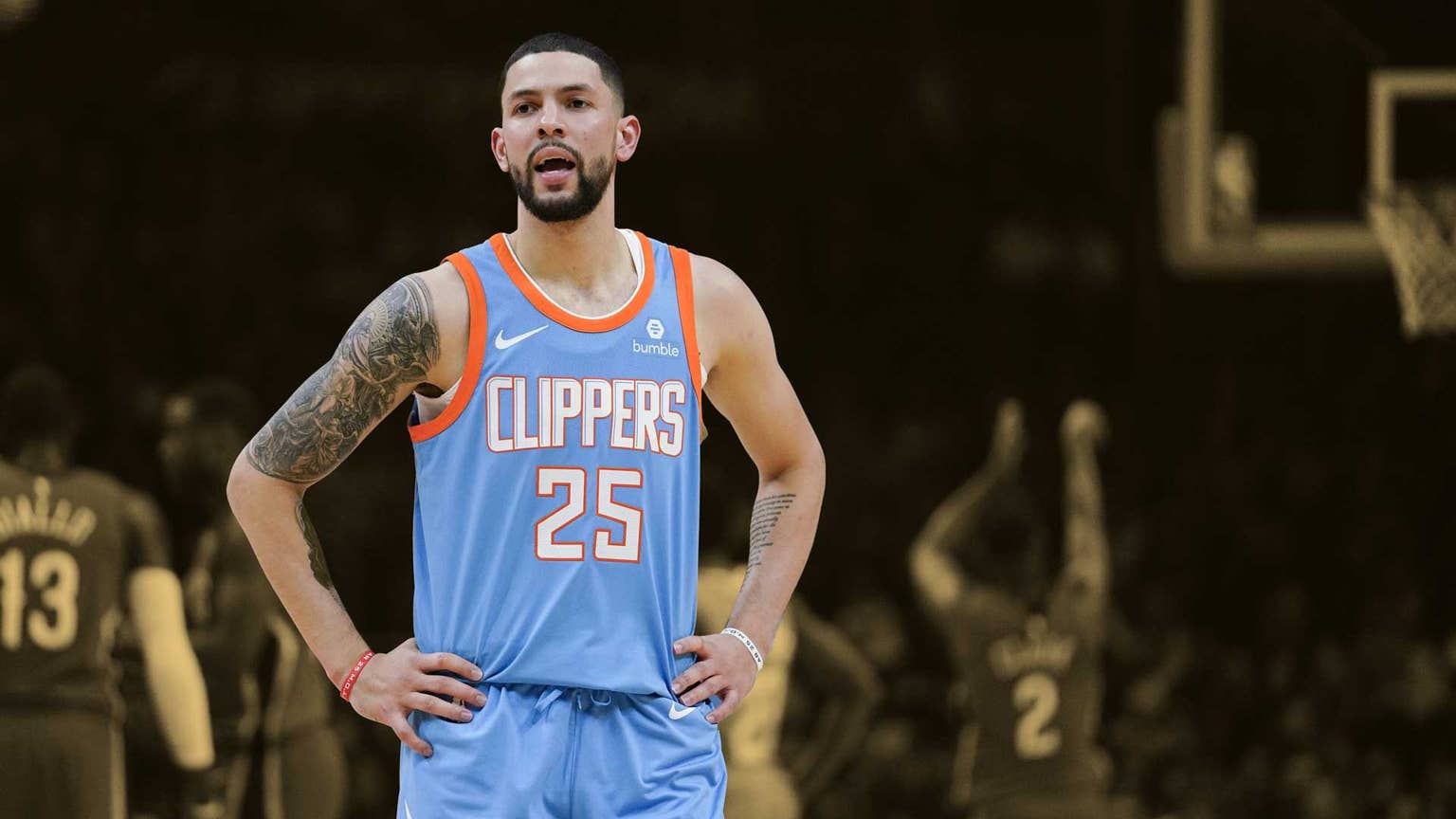 Austin Rivers tattoo sleeve visible in a reaction portrait