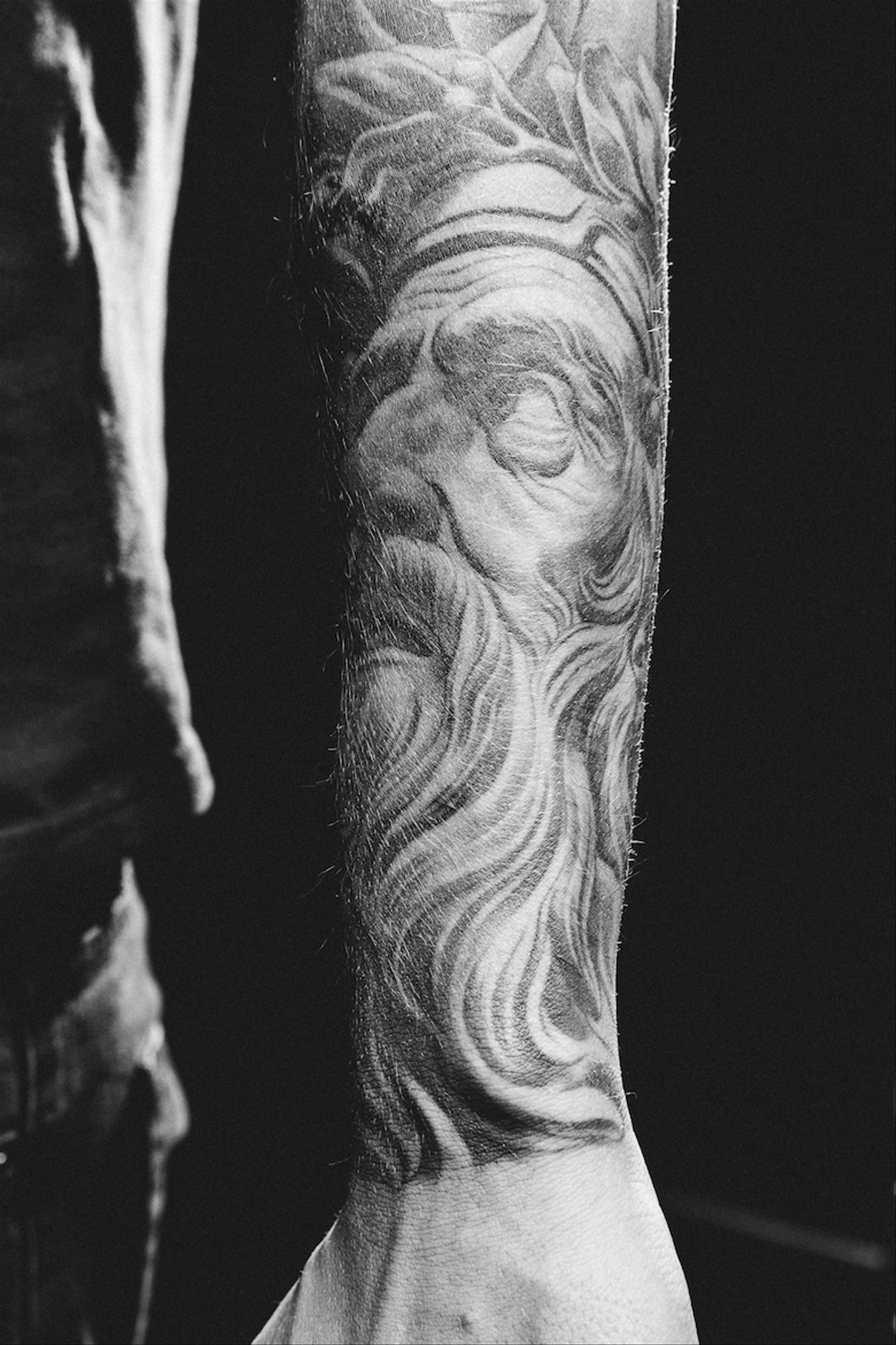 Avicii tattoo sleeve detail with three bandaged women