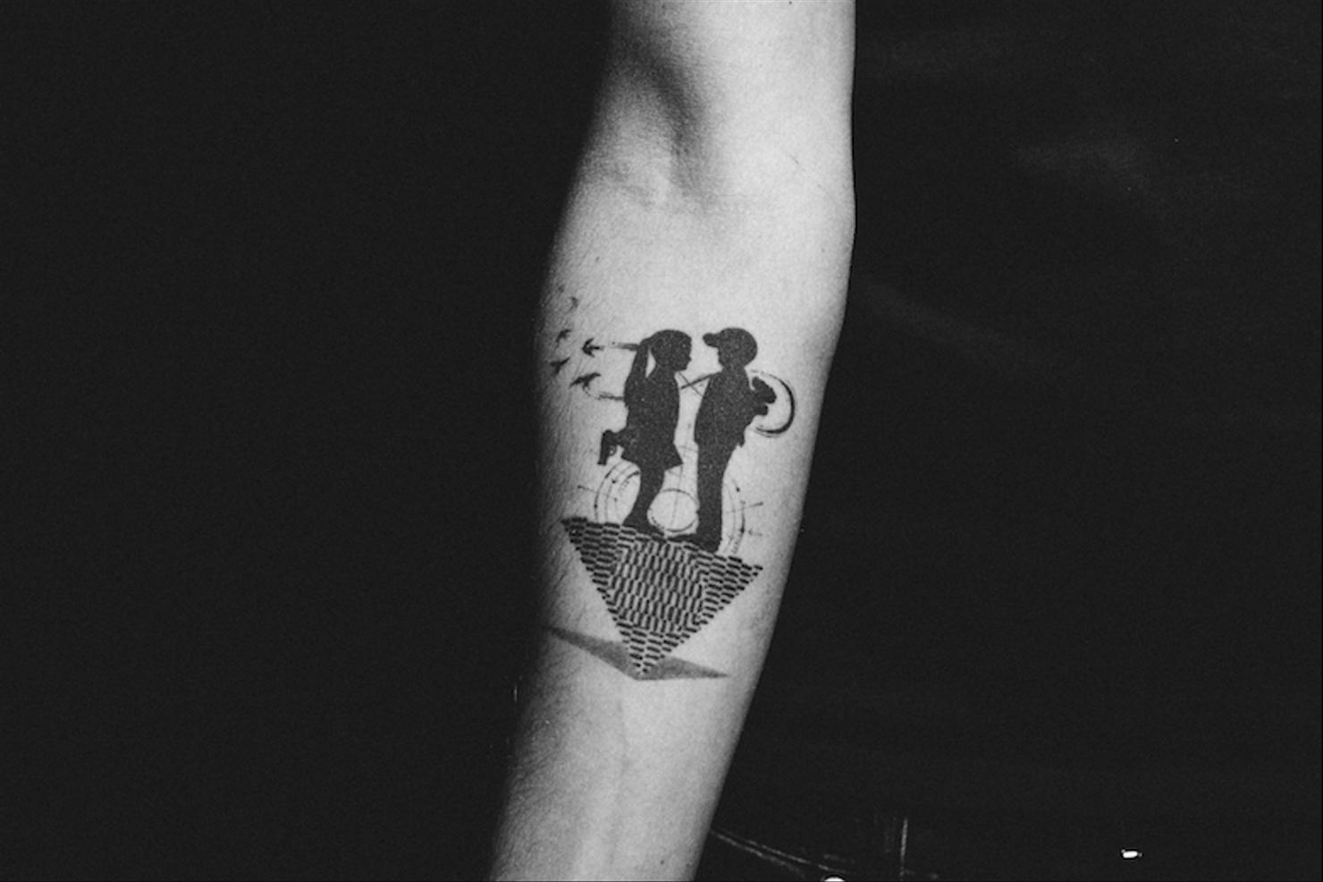 Avicii left arm tattoo sleeve wide view