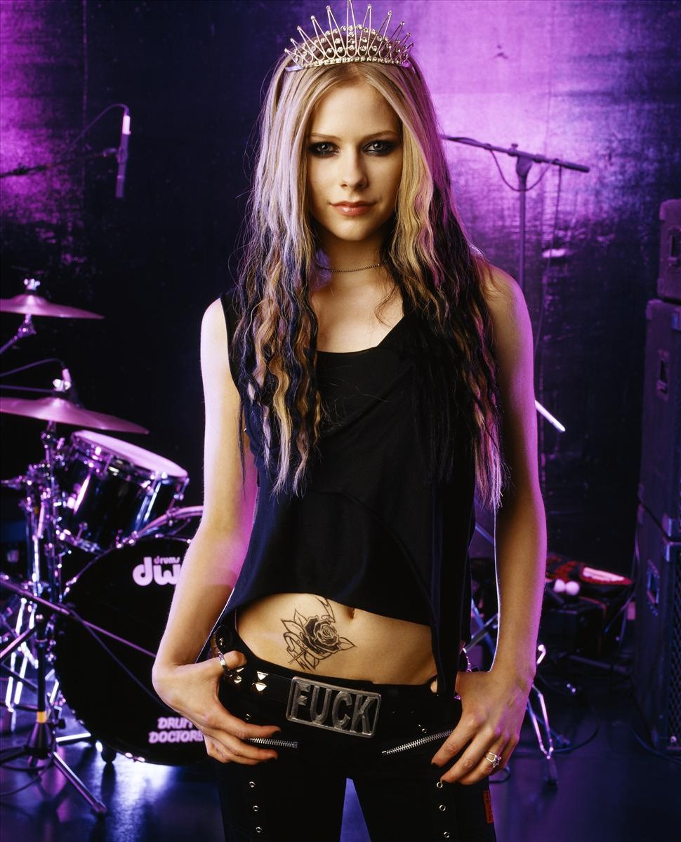 Avril Lavigne rose torso tattoo