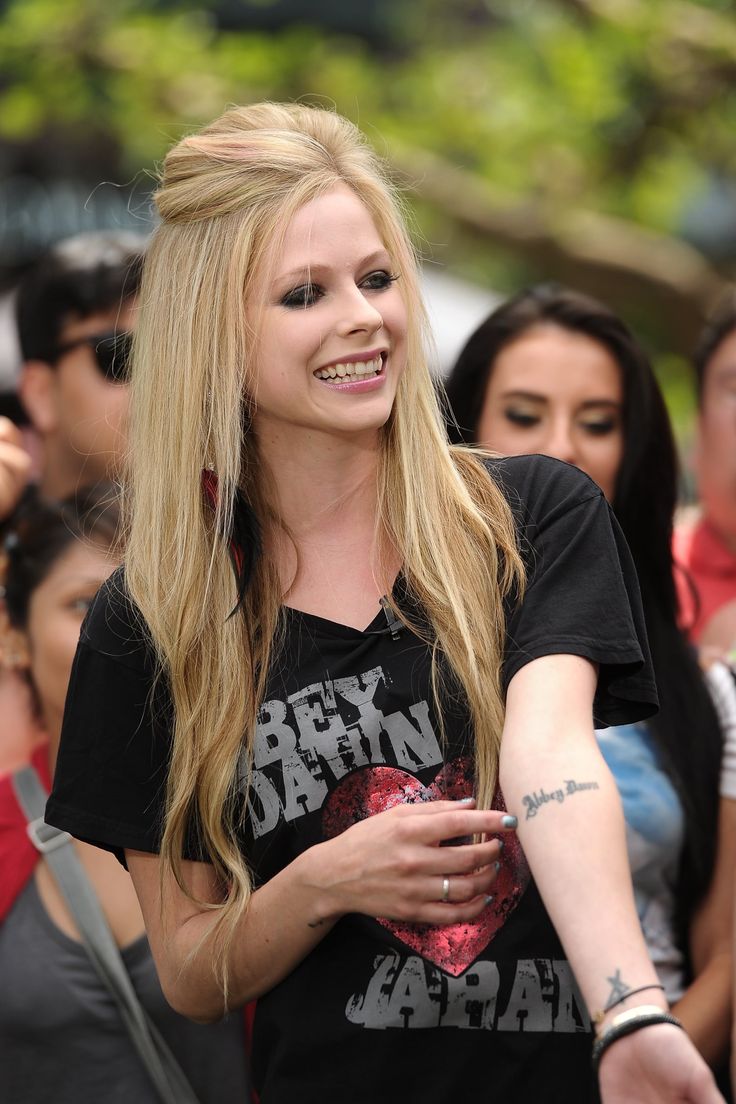 Avril Lavigne forearm tattoos