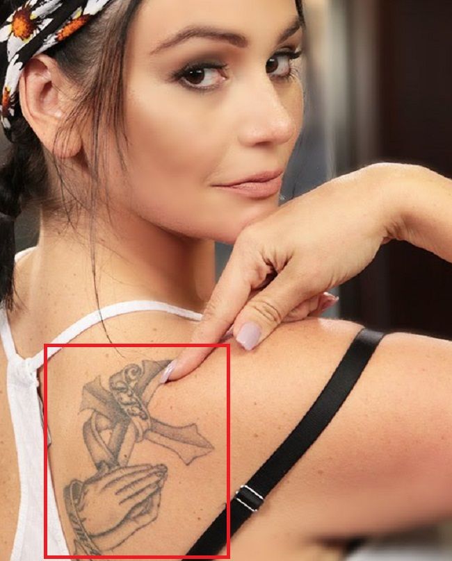 JWoww back cross and praying hands tattoo