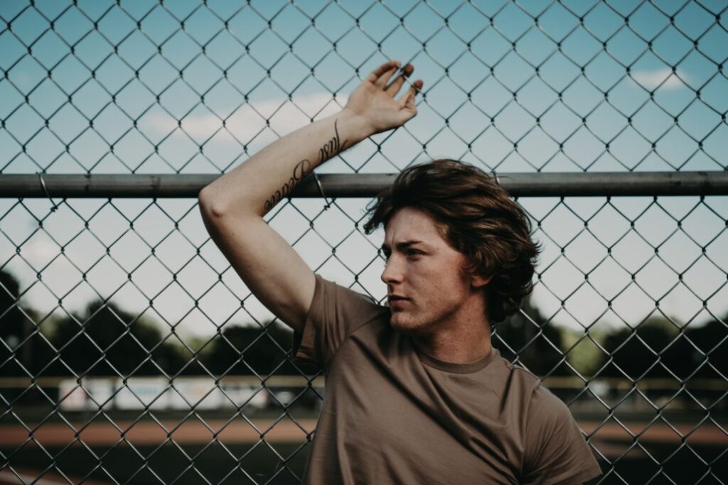 Bailey Zimmerman forearm tattoo in outdoor portrait
