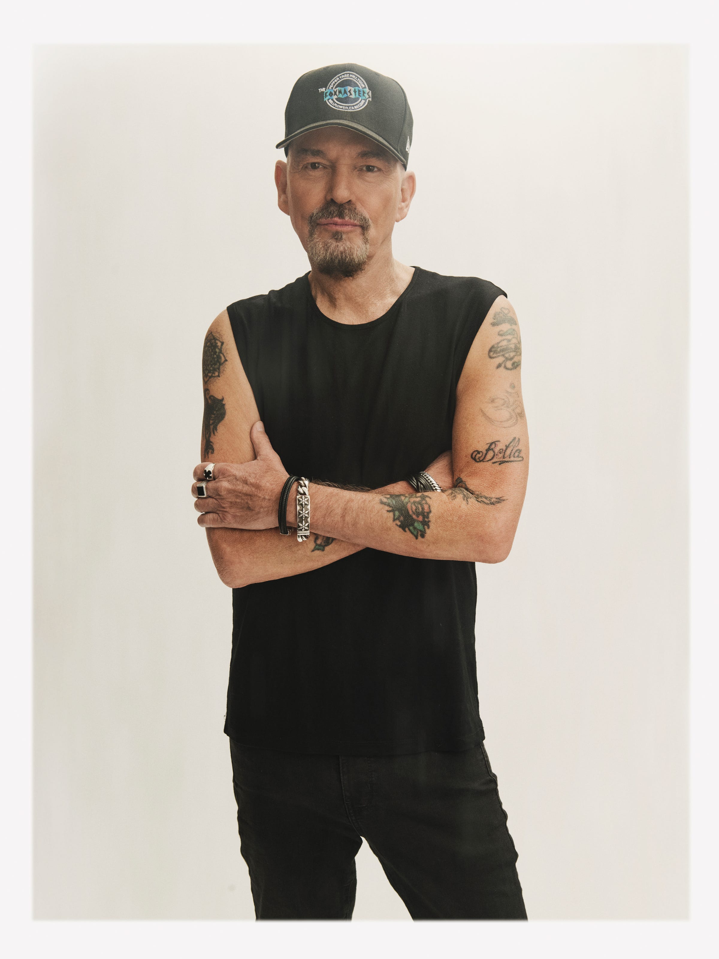 Billy Bob Thornton's visible arm tattoos after his earlier cover-up