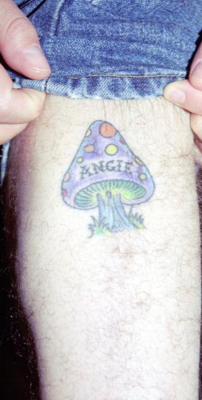Billy Bob Thornton's magic mushroom tattoo on his calf