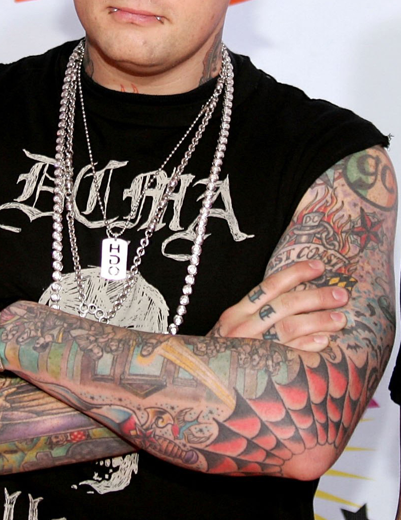 Benji Madden colorful right arm sleeve tattoos