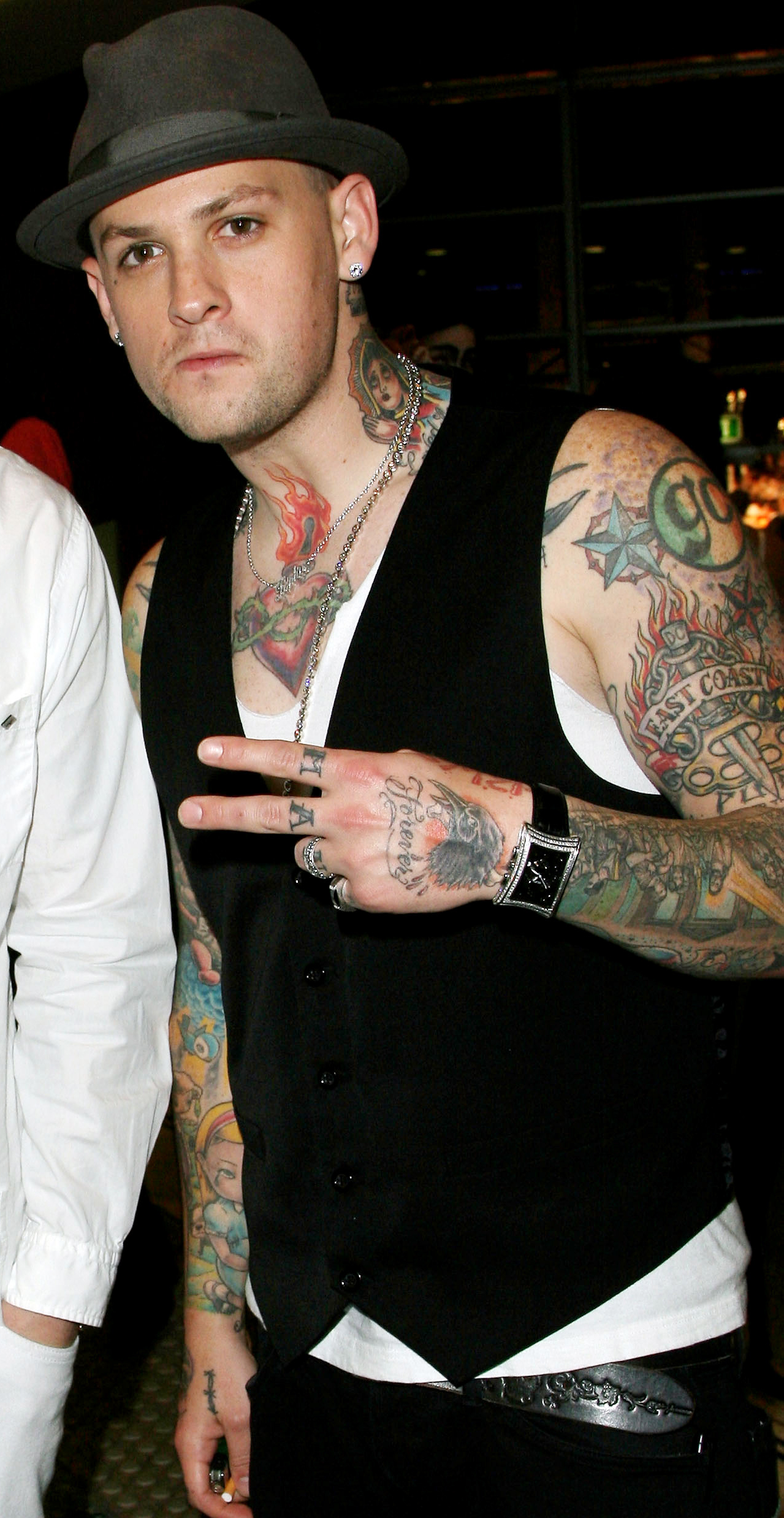 Benji Madden hand and arm tattoos