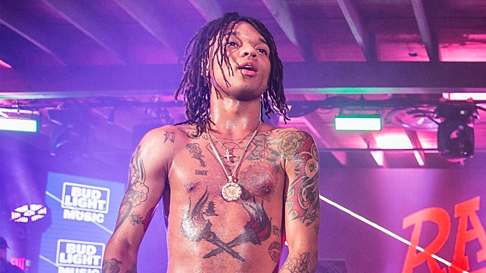 Swae Lee face-visible portrait with chest and arm tattoos