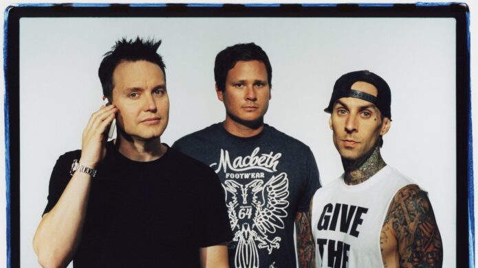 Blink-182 members Mark Hoppus, Tom DeLonge, and Travis Barker in a studio portrait