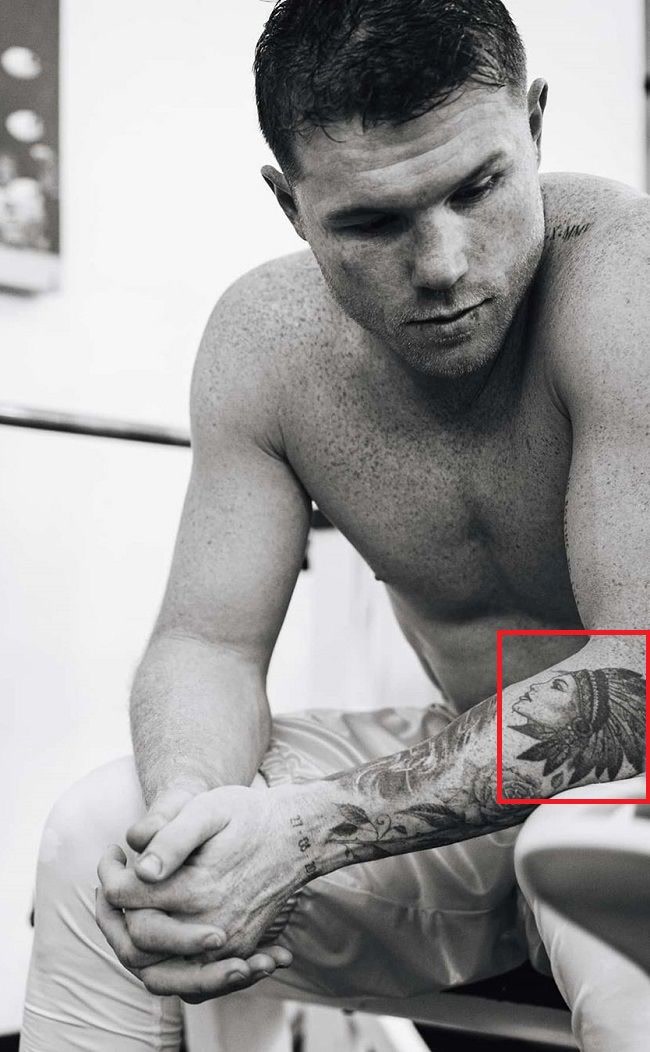 Canelo Alvarez lady with plume tattoo on his forearm