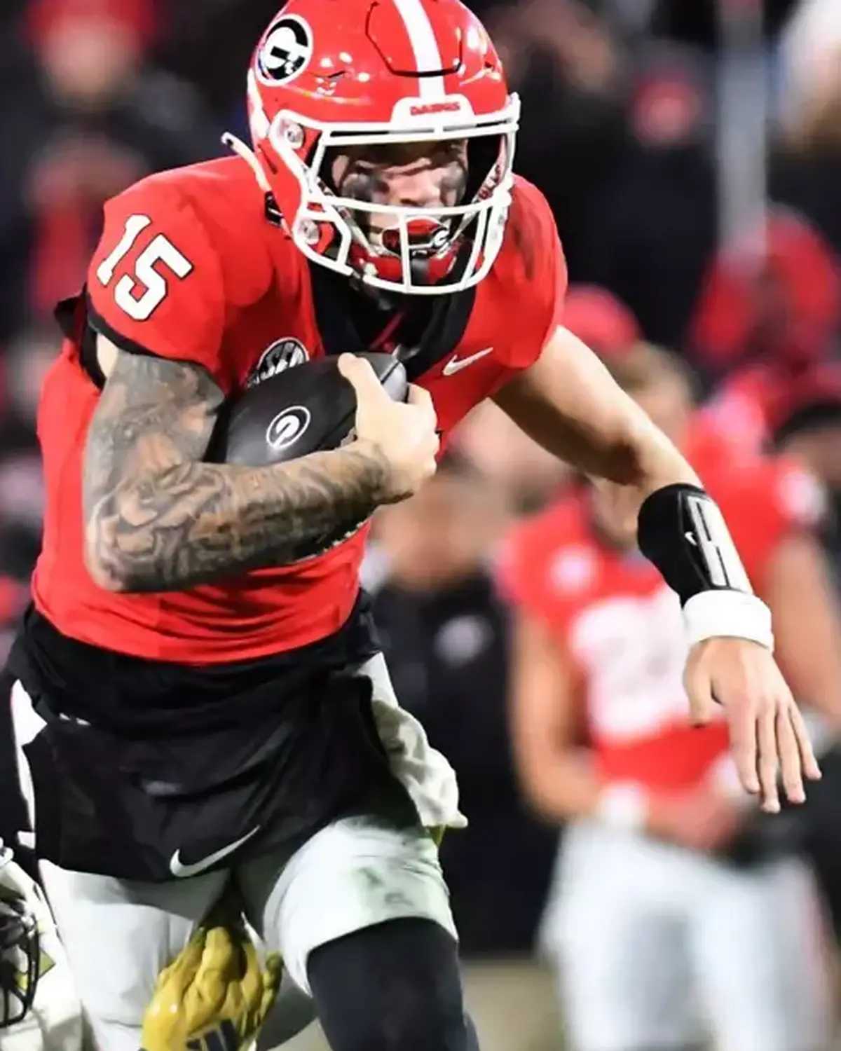 Carson Beck arm sleeve tattoo closeup