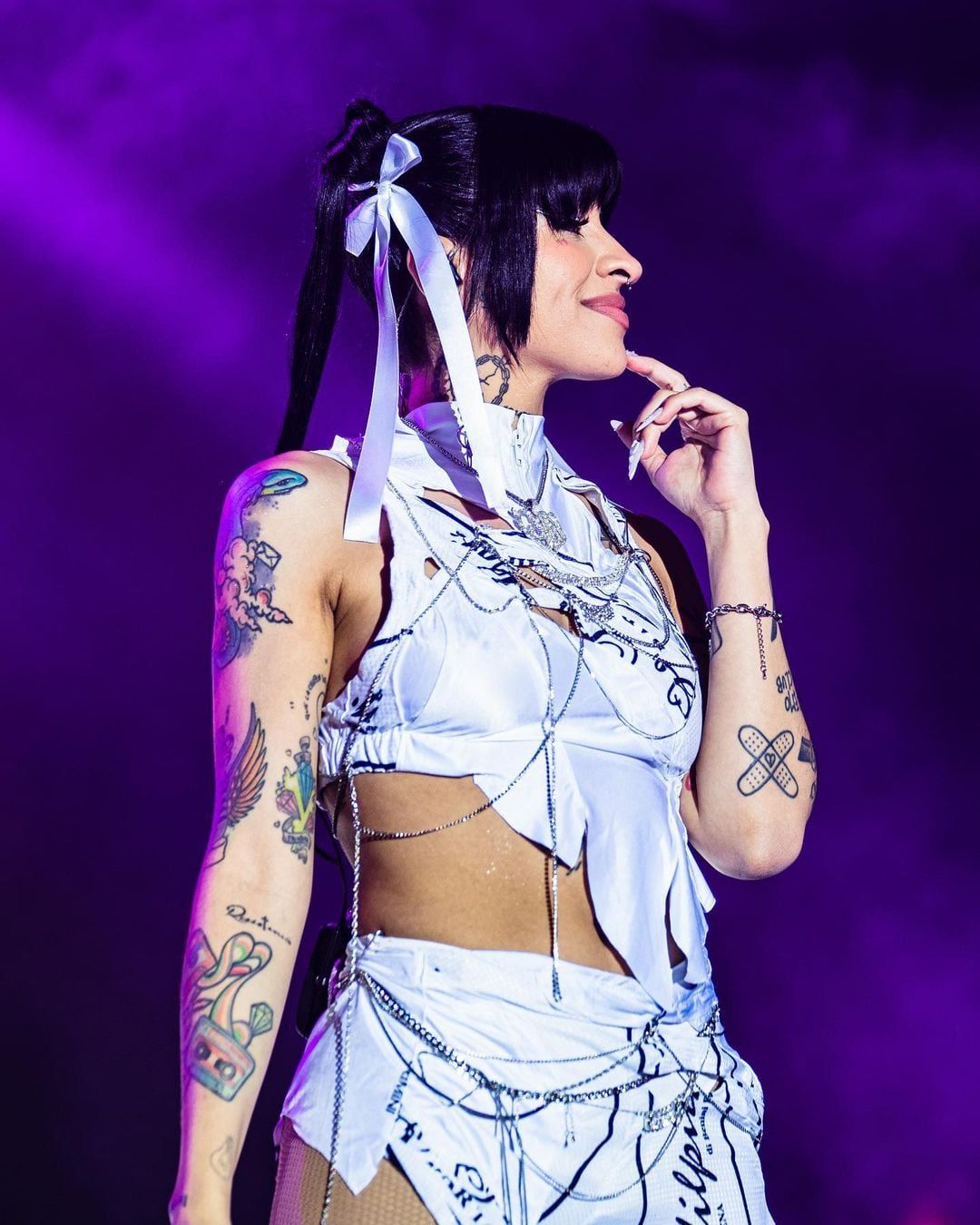 Cazzu anime-inspired abdomen tattoo
