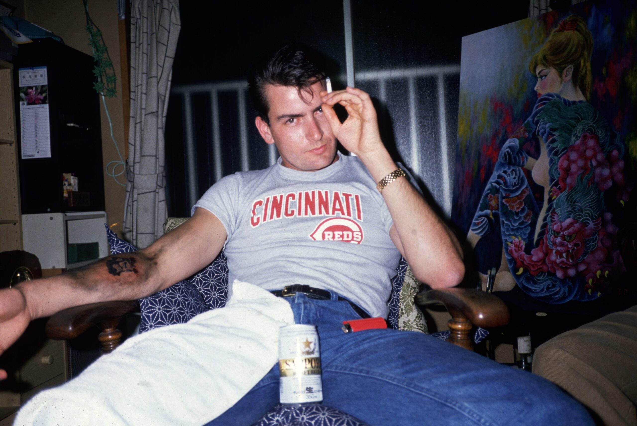 Charlie Sheen cigarette forearm tattoo