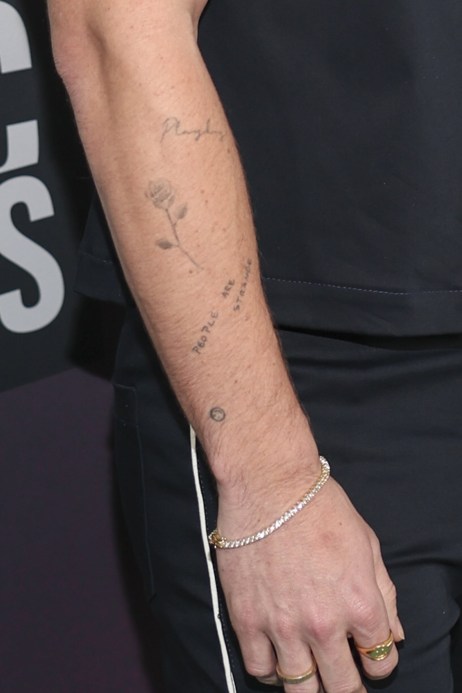 Chase Stokes People Are Strange arm tattoo