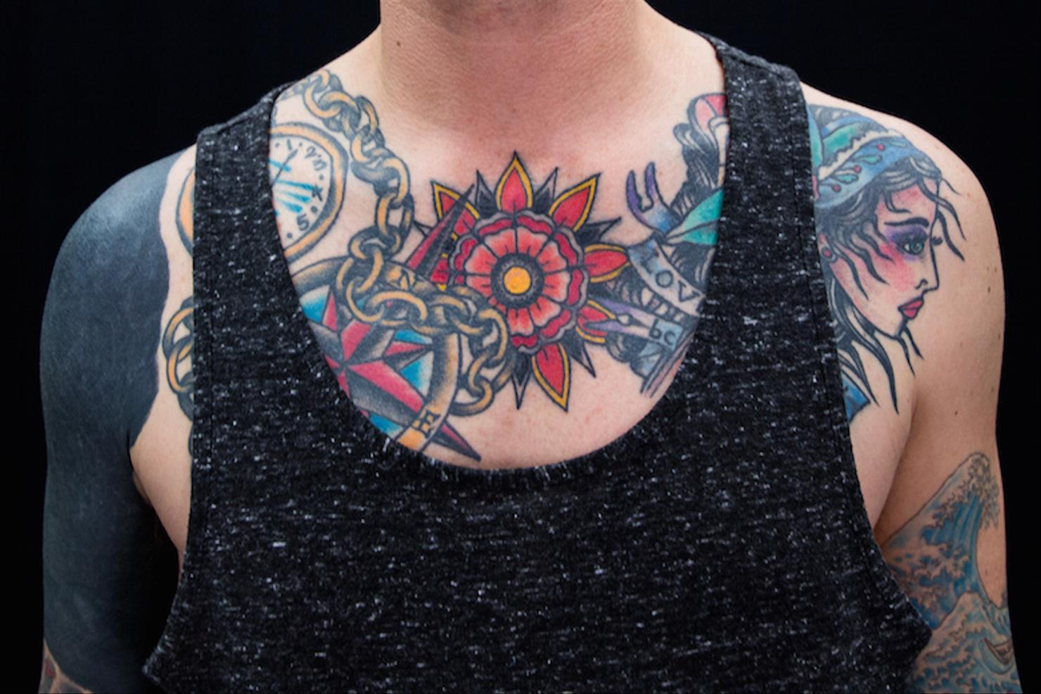 Chris Carrabba traditional chest rose tattoo