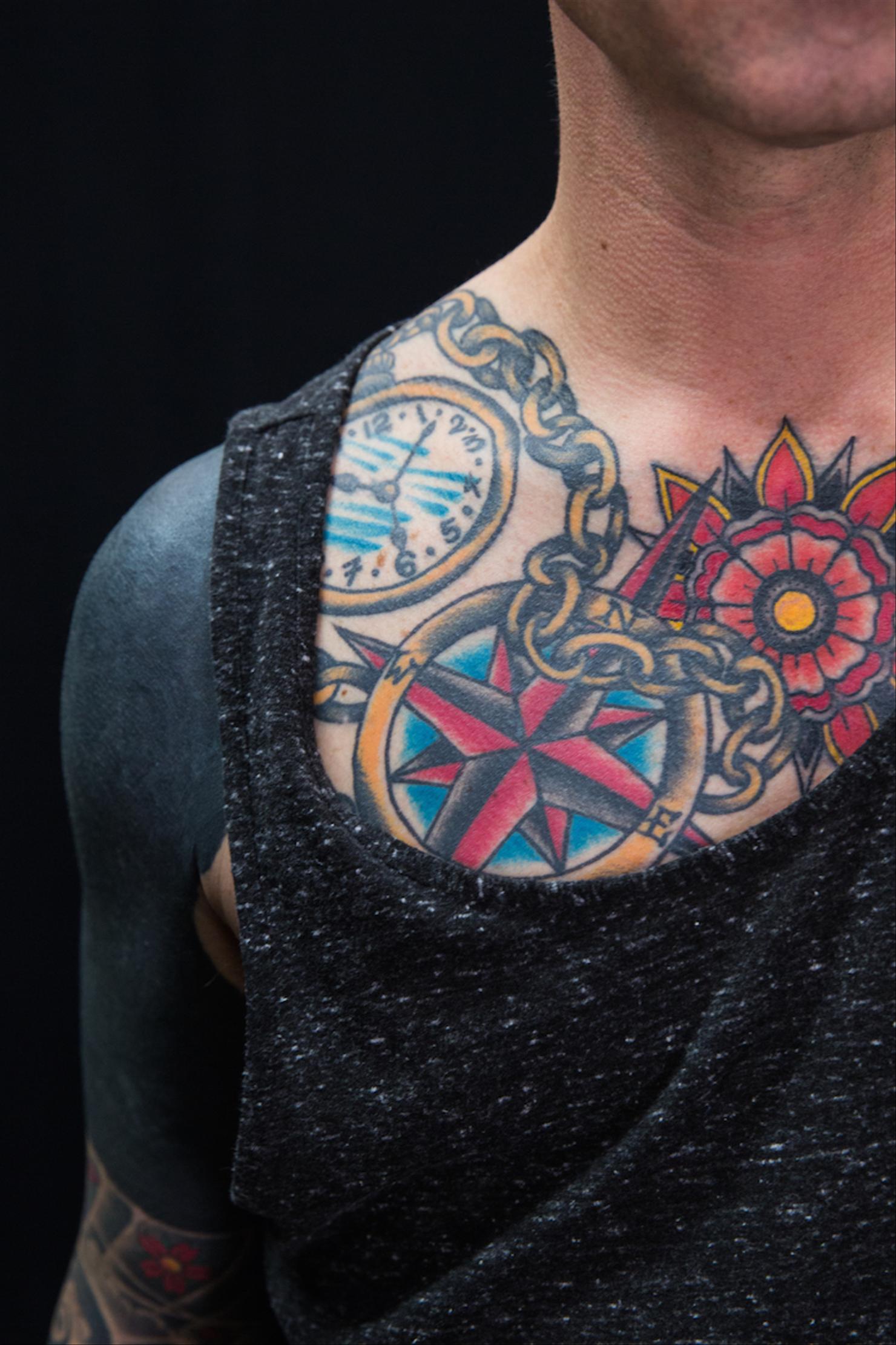 Chris Carrabba timepiece and nautical compass shoulder tattoo