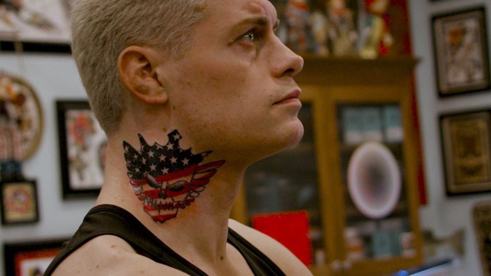 Cody Rhodes skull and wings neck tattoo