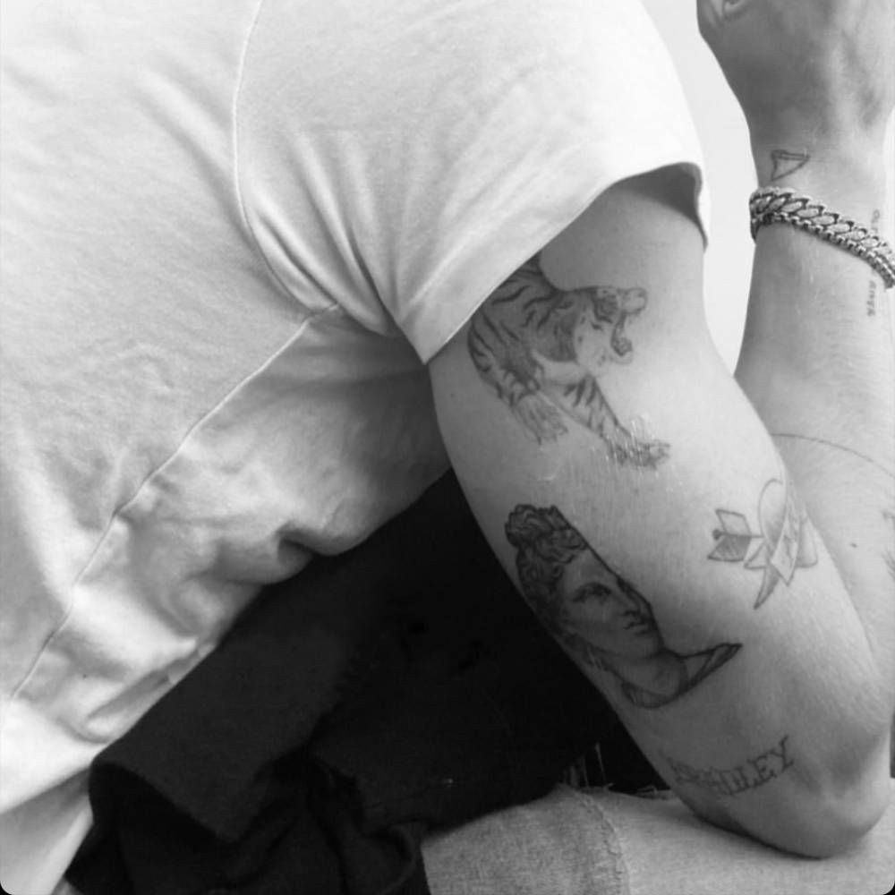 Cody Simpson Apollo tattoo