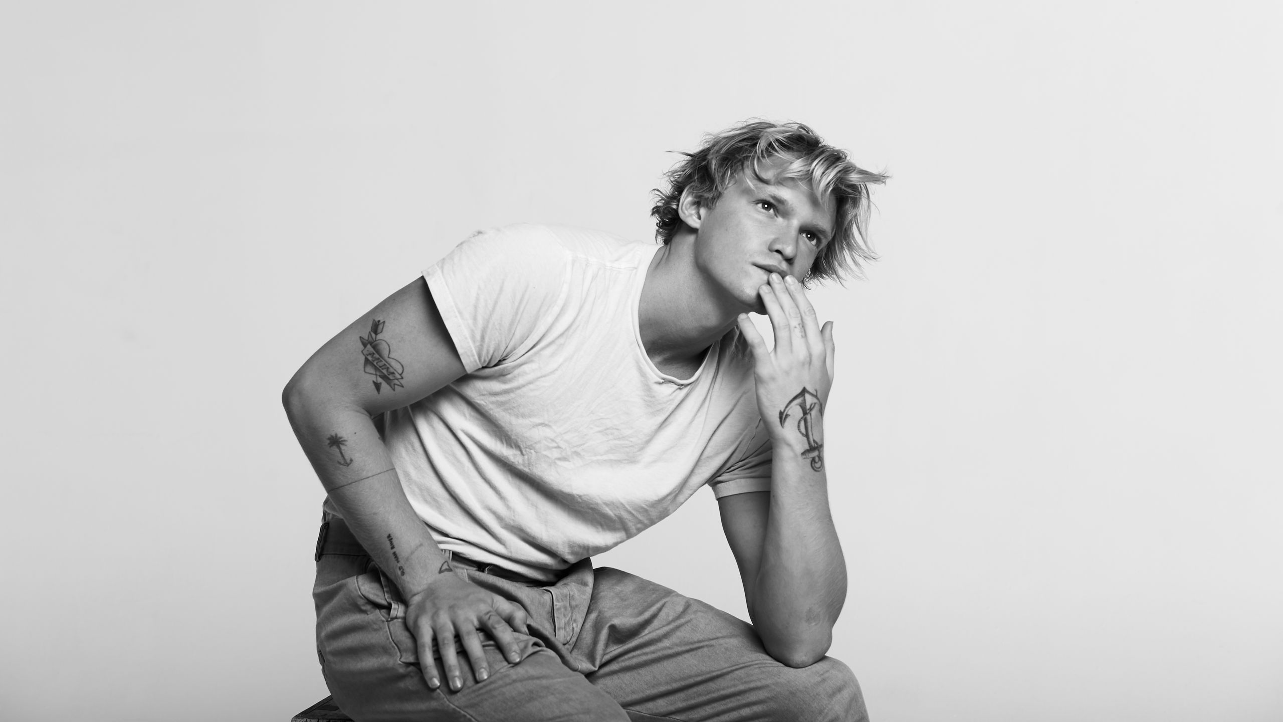 Cody Simpson visible wrist and arm tattoos