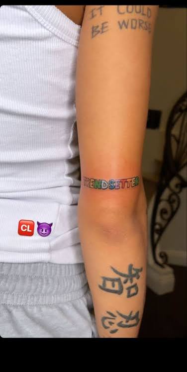 Coi Leray forearm tattoos
