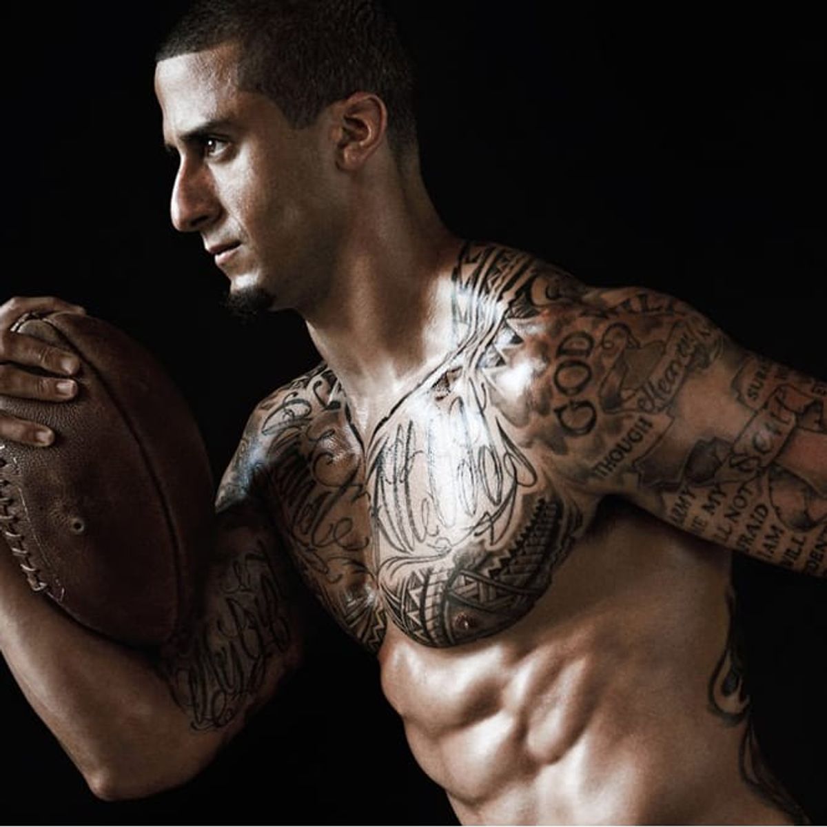 Colin Kaepernick chest and arm tattoos