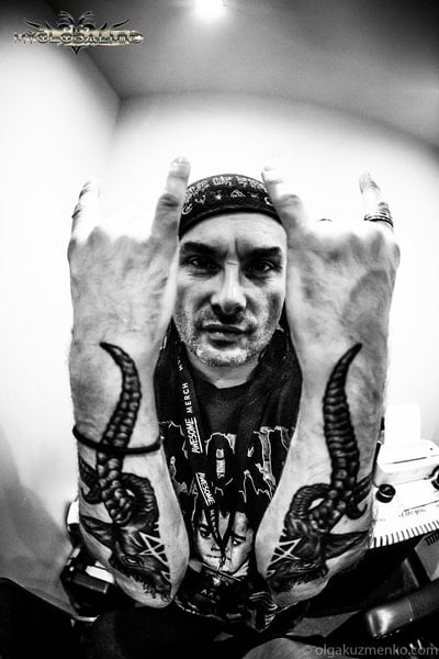 Dani Filth matching horn forearm tattoos