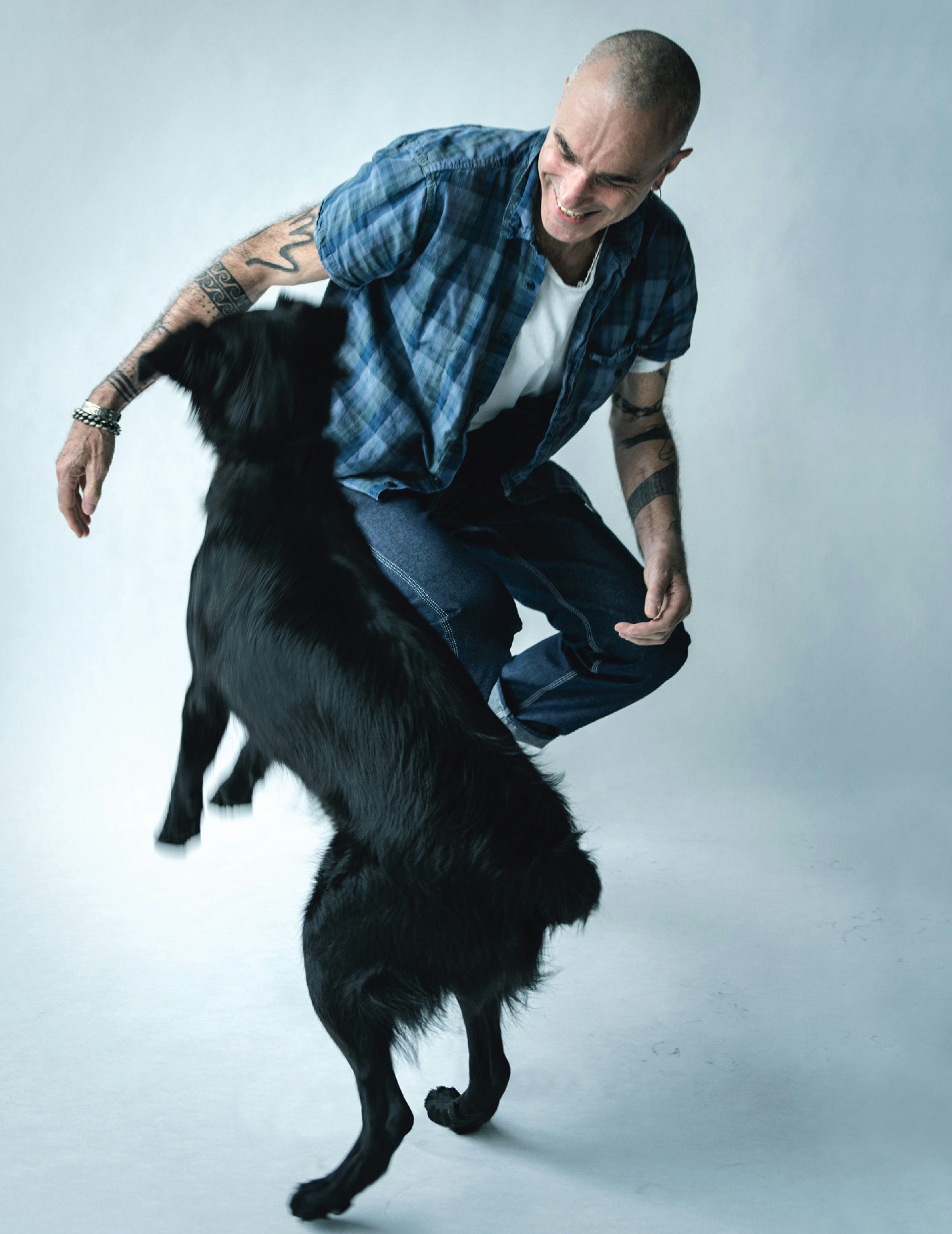 Daniel Day-Lewis with visible shoulder tattoos