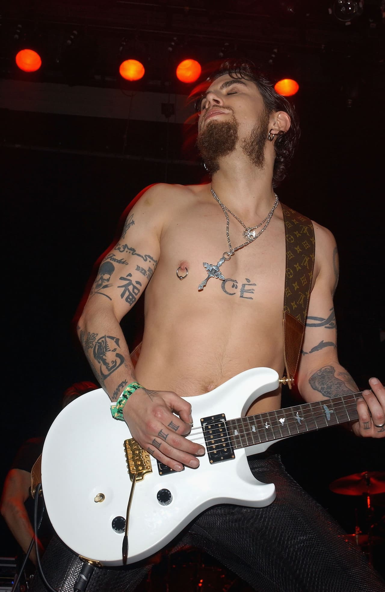 Dave Navarro CE initials chest tattoo
